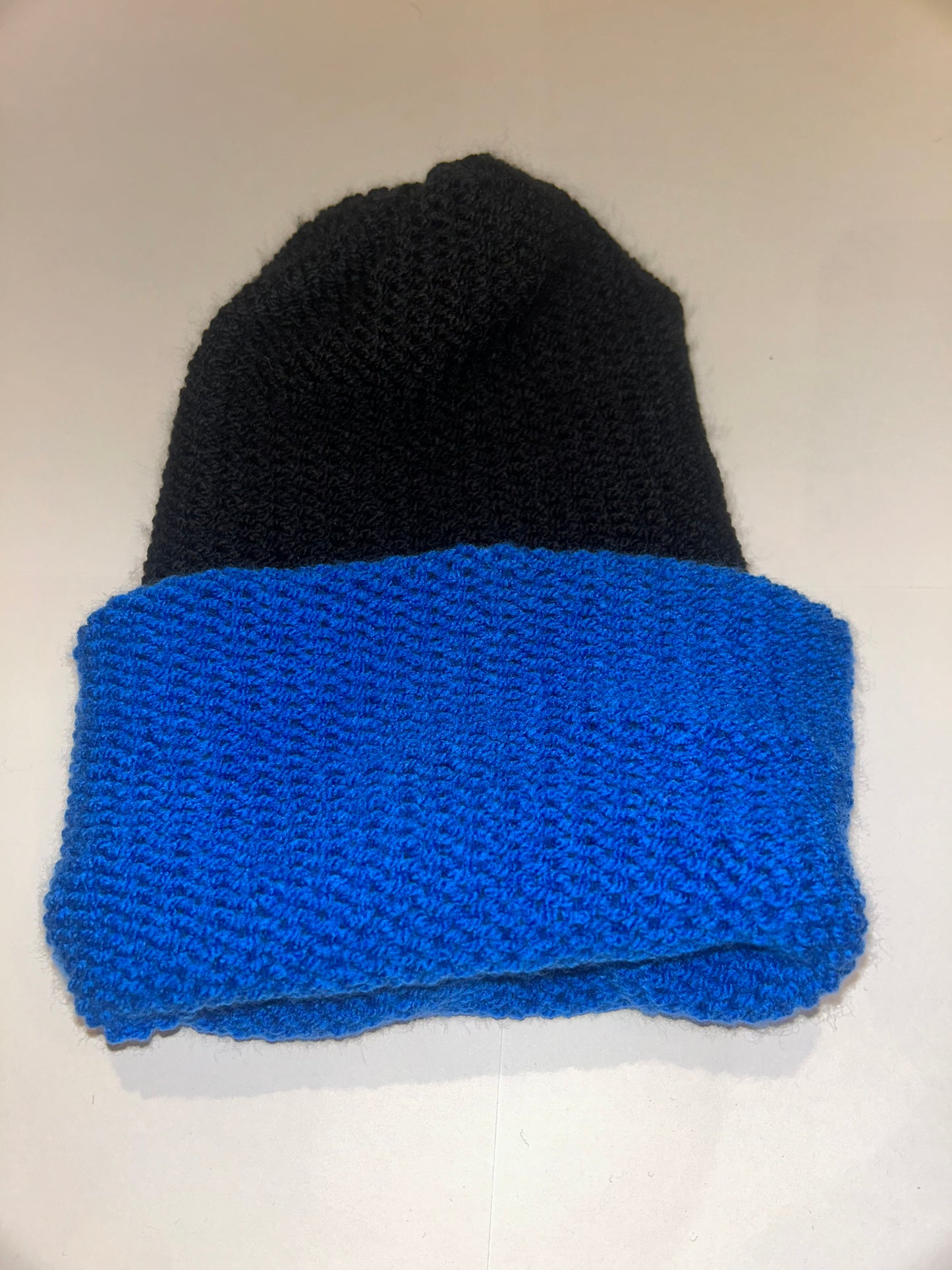 Black and Blue Wooly Beanie reversible handmade knit hat in black and deep blue.
