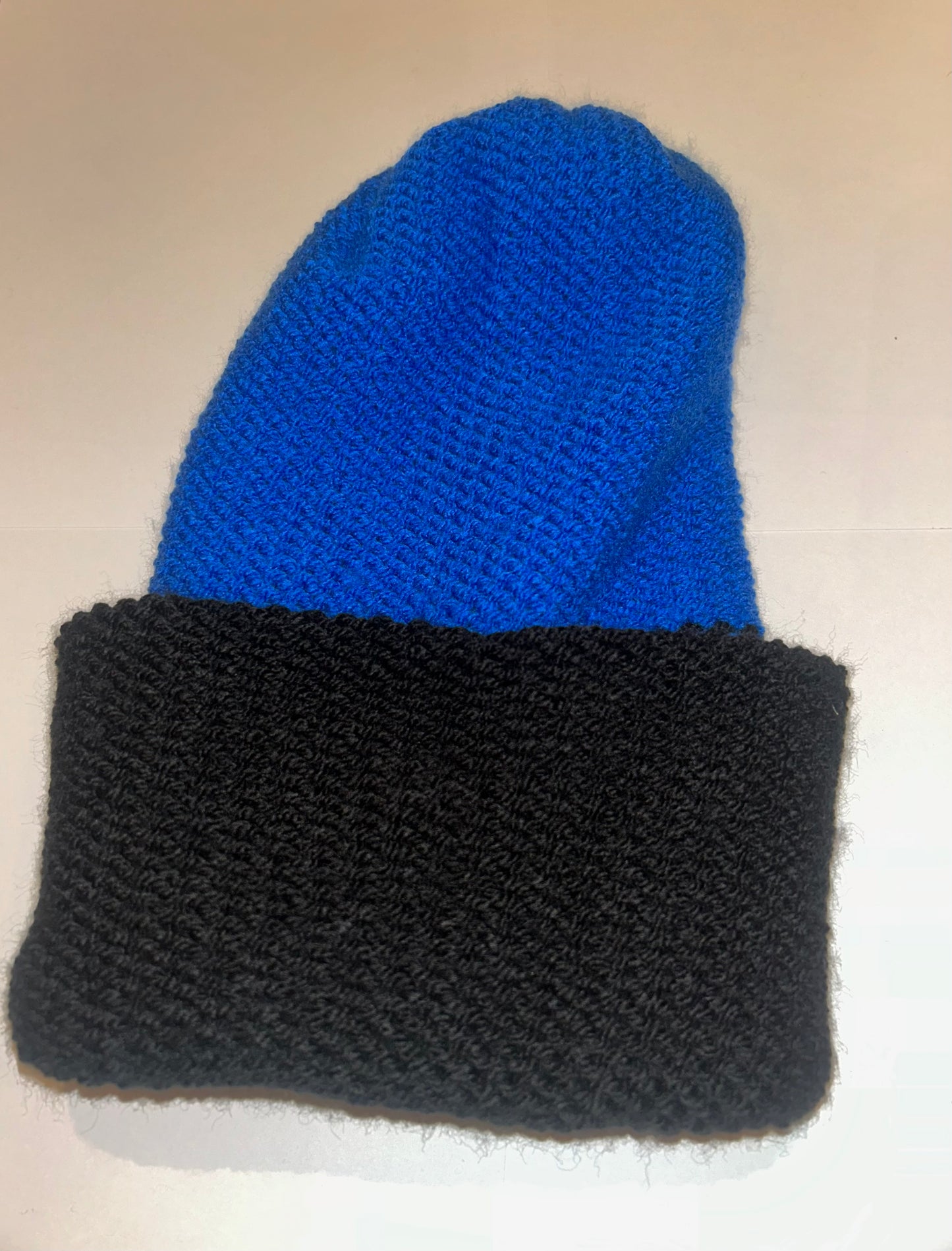Reversible Blue Black Beanie handmade wooly hat in deep blue and black.