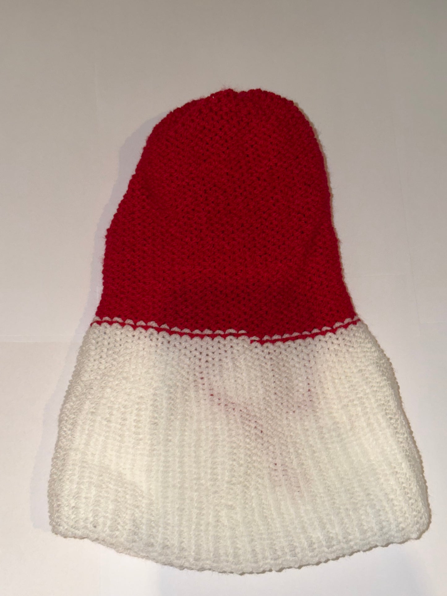 Red and White Christmas Beanie | Handmade Wooly Holiday Hat, featuring a vibrant red crown and a cozy white base.