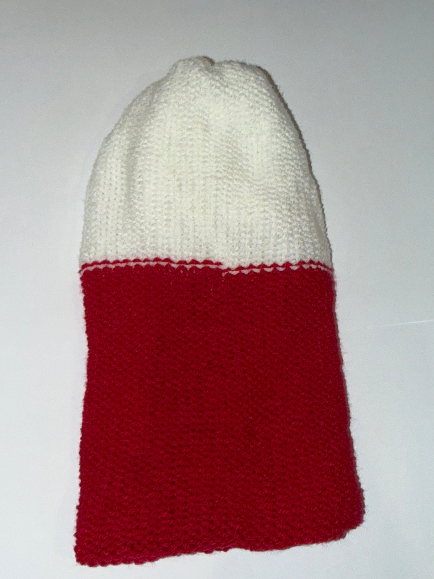 Festive Christmas Beanie in white and red, handcrafted wooly holiday hat for warm winter celebrations.
