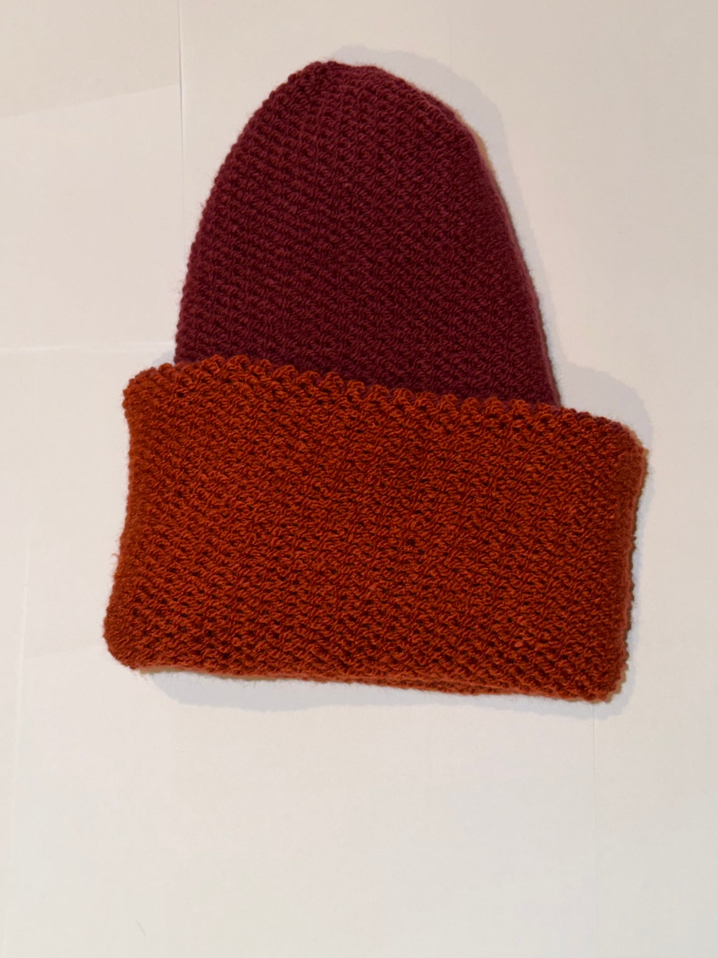 Handmade Reversible Wooly Beanie Plum and Fox Rust showing the autumnal dual-tone knit.
