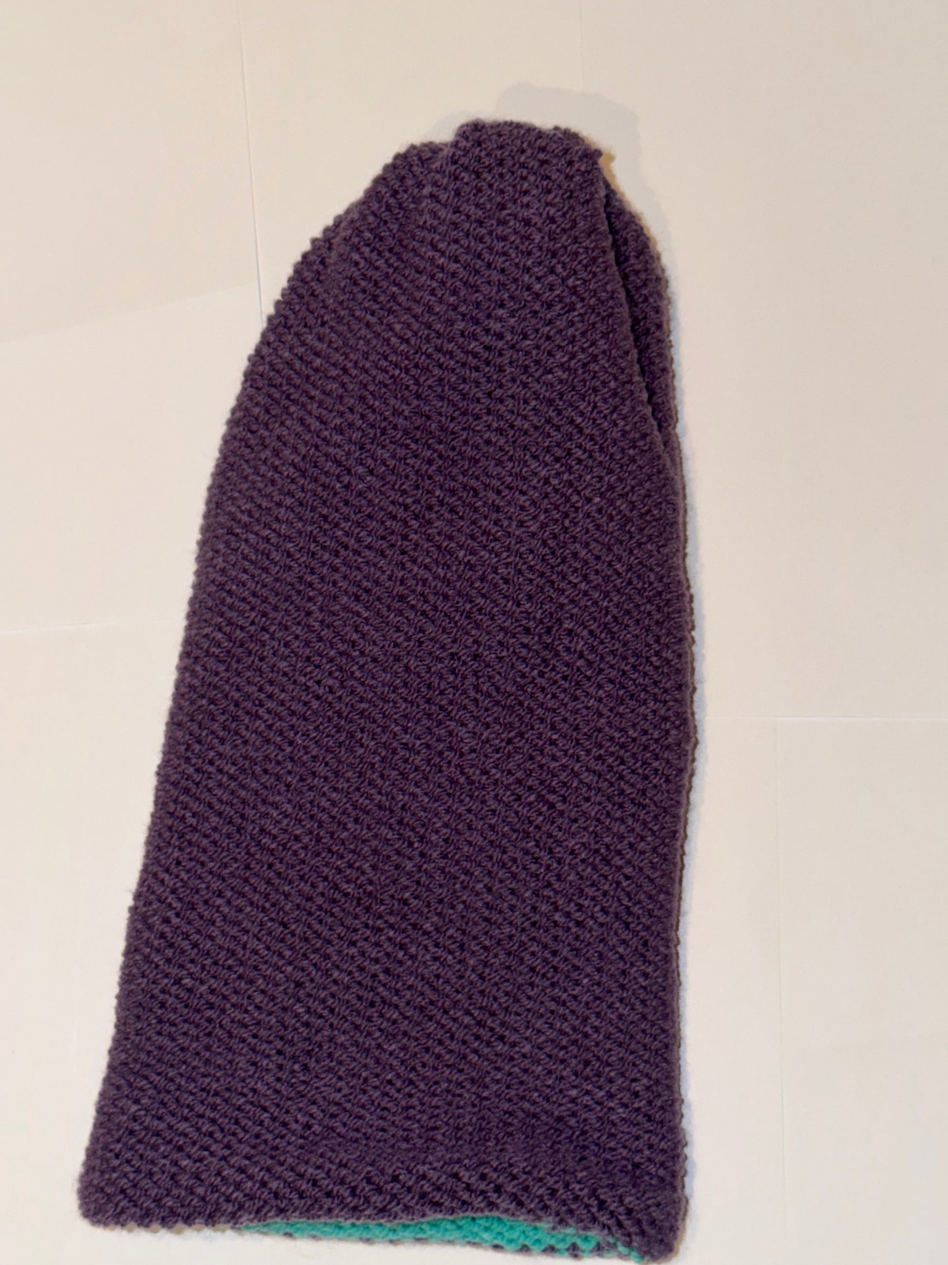 Handmade Reversible Wooly Beanie Dark Lilac and Aqua featuring a vibrant dual-tone knit.