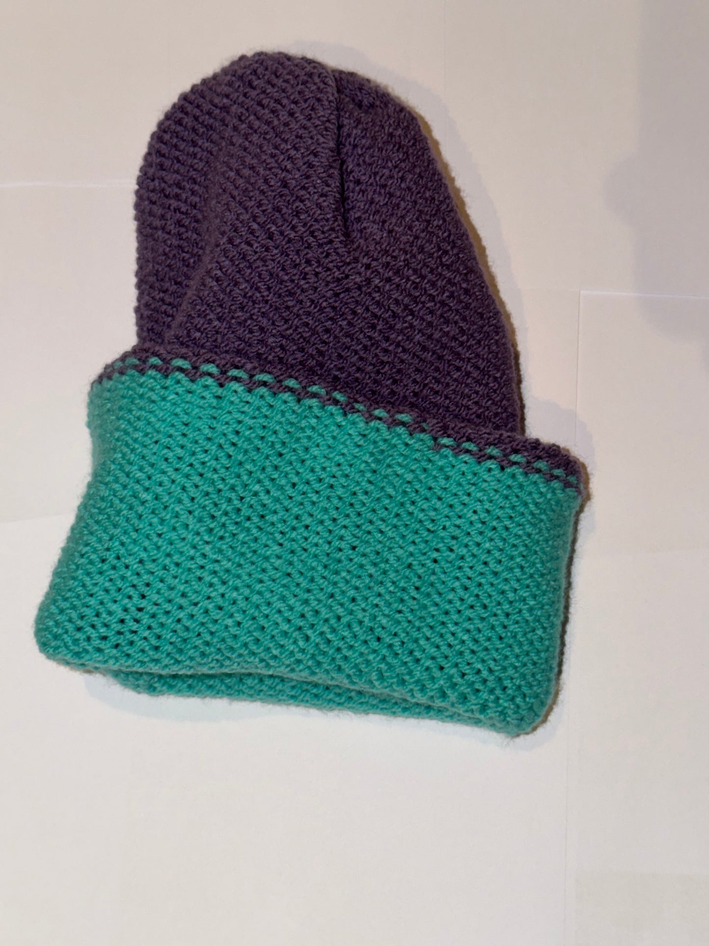 Handmade Reversible Wooly Beanie Dark Lilac and Aqua featuring a vibrant dual-tone knit.