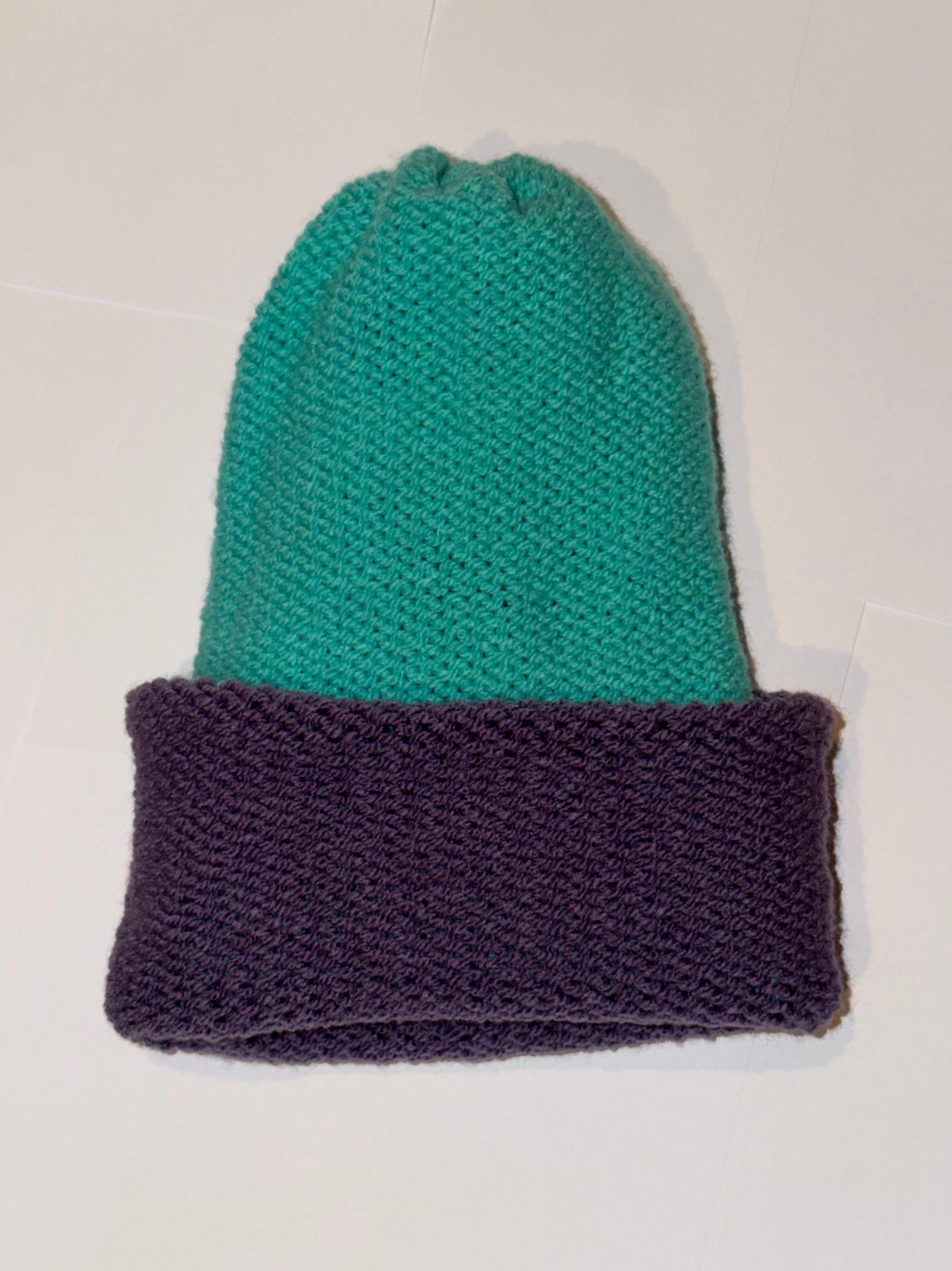 Handmade Reversible Wooly Beanie Dark Lilac and Aqua featuring a vibrant dual-tone knit.