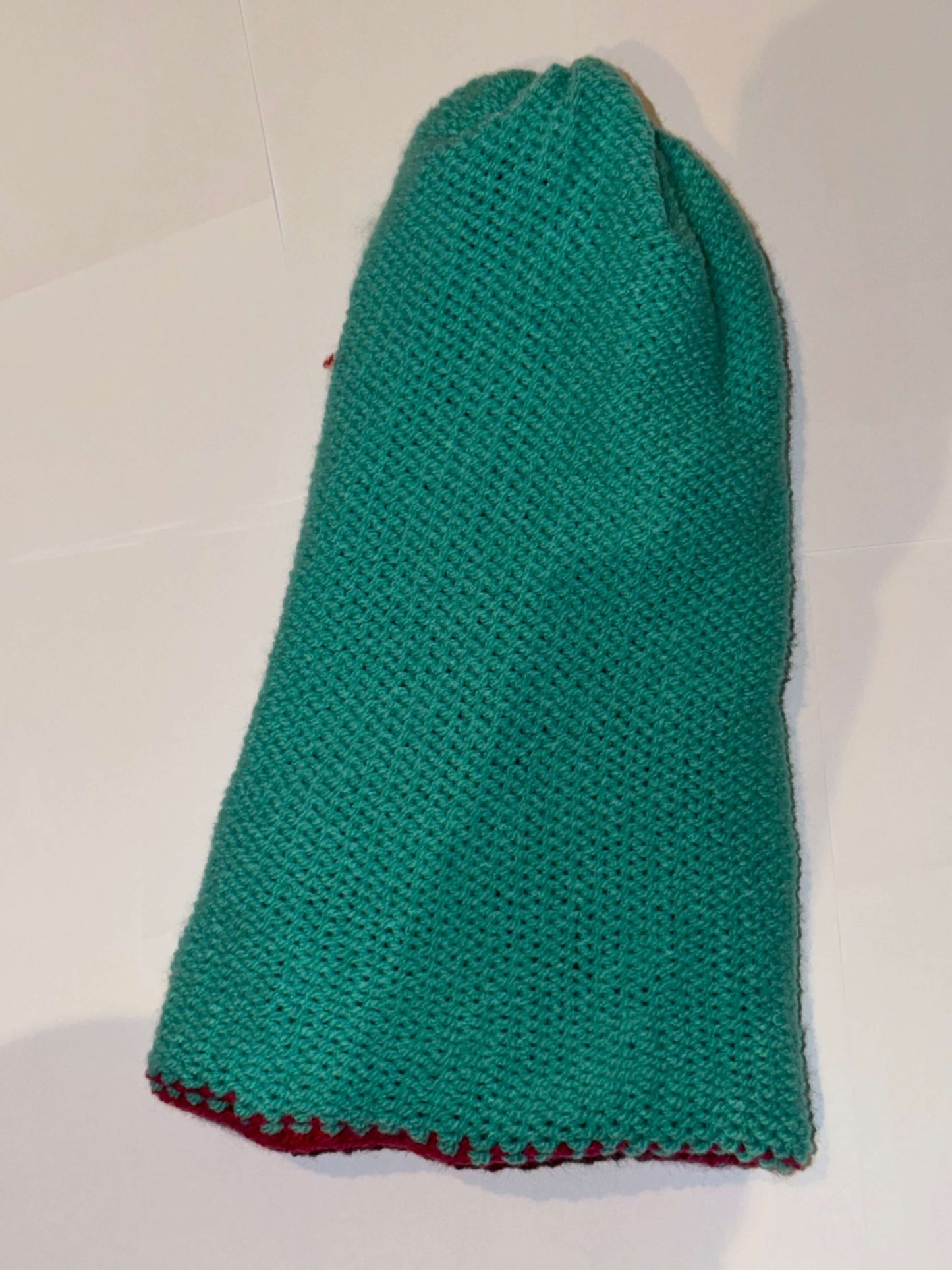 Handmade Reversible Wooly Beanie Aqua and Magenta showing the two-tone artisanal knit design.