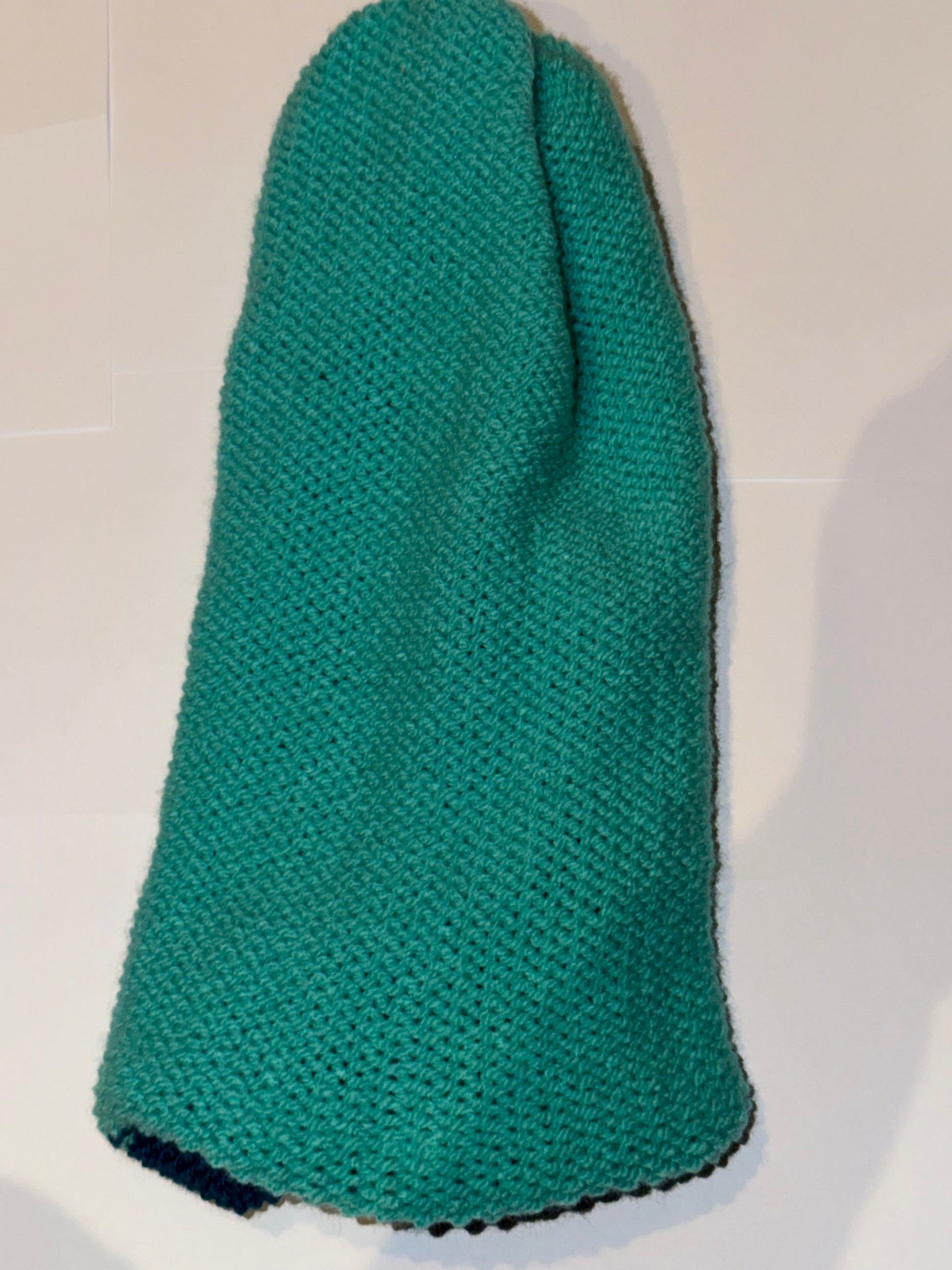 Handmade Reversible Wooly Beanie Petrol and Aqua showing the dual-tone blue-green knit.