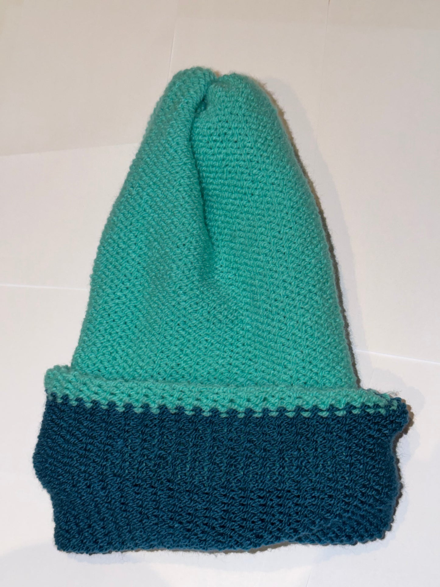 Handmade Reversible Wooly Beanie Petrol and Aqua showing the dual-tone blue-green knit.