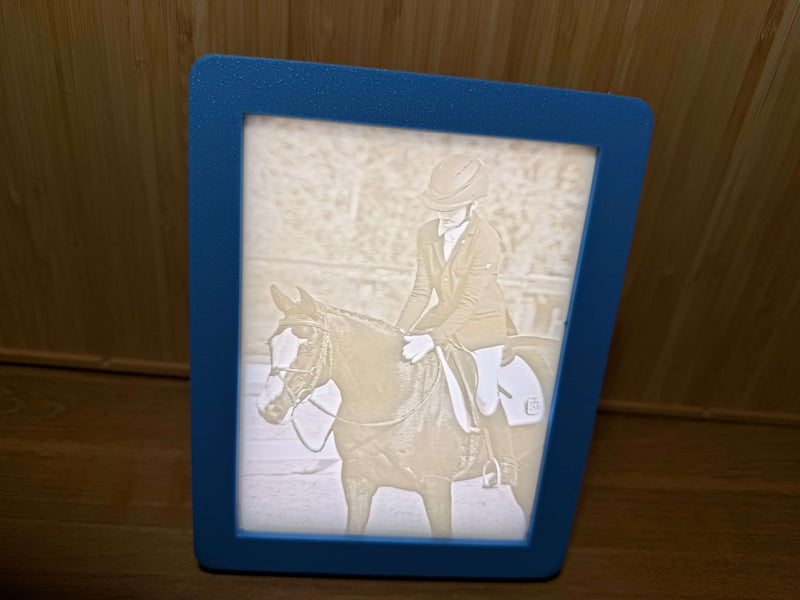 Lithophane lit — photo revealed in warm light